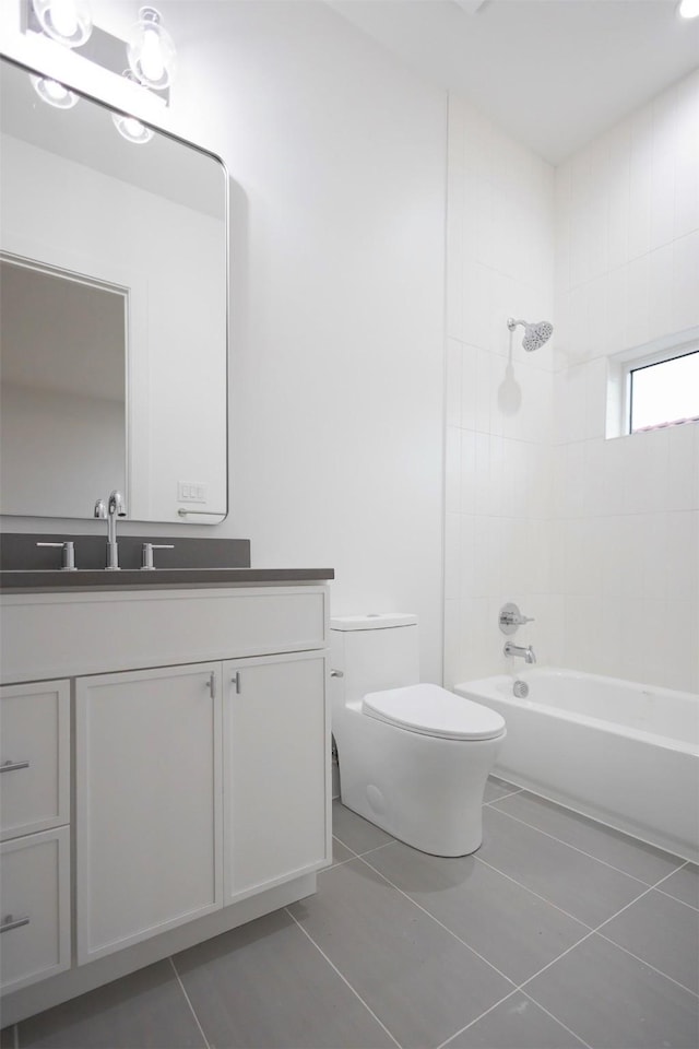 2935 Lovers Ln, University Park, TX 75225 - bathroom featuring tile patterned flooring, toilet, vanity, and bathing tub / shower combination