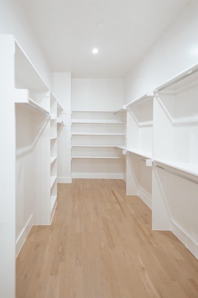 2935 Lovers Ln, University Park, TX 75225 - spacious closet with light wood finished floors