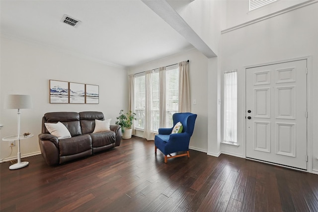 1500 Cool Springs Dr, Allen, TX 75013 - living area featuring wood-type flooring, crown molding, and baseboards
