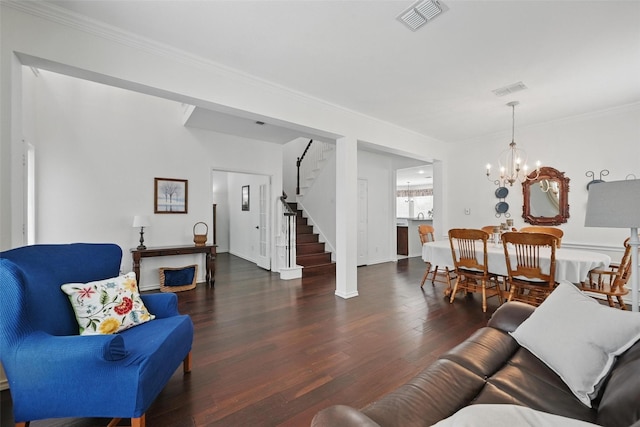 1500 Cool Springs Dr, Allen, TX 75013 - living area featuring a chandelier, wood finished floors, stairway, crown molding, and baseboards