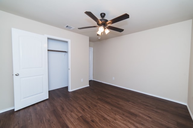 2105 Meadow View Dr, Princeton, TX 75407 - unfurnished bedroom with dark wood-type flooring, baseboards, a closet, and a ceiling fan