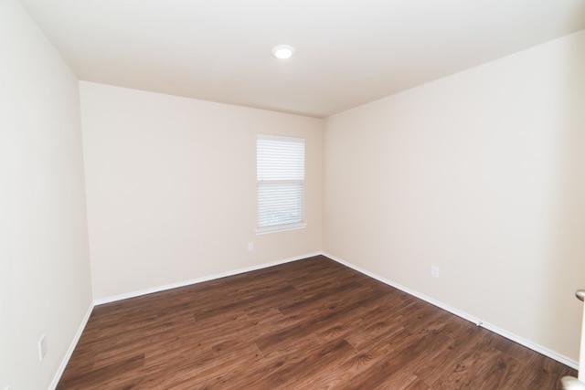 2105 Meadow View Dr, Princeton, TX 75407 - spare room with dark wood-style floors and baseboards