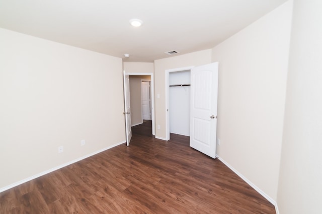 2105 Meadow View Dr, Princeton, TX 75407 - unfurnished bedroom featuring dark wood-style flooring, baseboards, and a closet