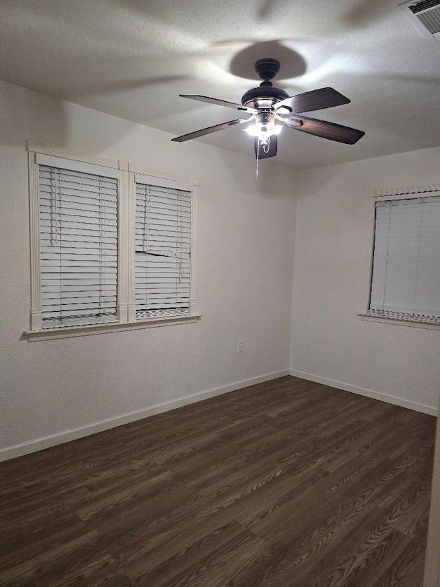 3915 Flory St, North Richland Hills, TX 76180 - unfurnished room featuring wood finished floors, a ceiling fan, and baseboards