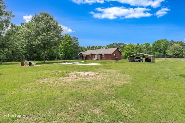 1170 163rd Hwy, Benton, LA 71006 - view of grassy yard with a carport and view of wooded area