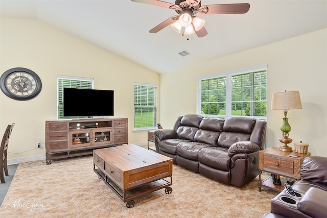 1170 163rd Hwy, Benton, LA 71006 - living area featuring vaulted ceiling, light carpet, ceiling fan, and baseboards