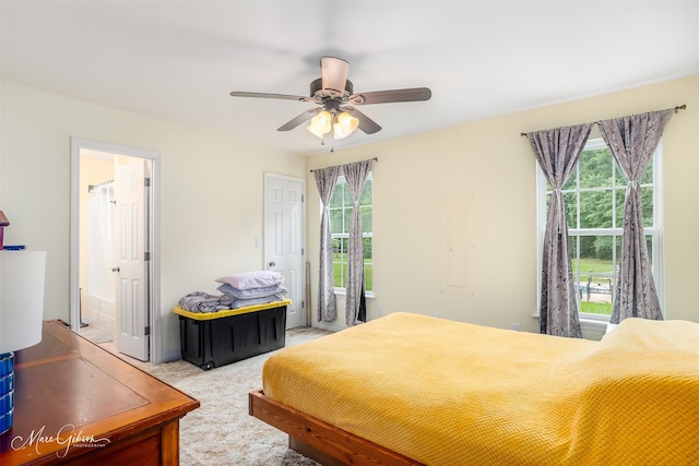 1170 163rd Hwy, Benton, LA 71006 - bedroom featuring ensuite bath, light colored carpet, and ceiling fan