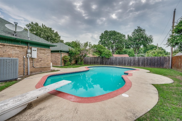 4312 High Spgs, Arlington, TX 76016 - view of swimming pool with cooling unit, a fenced backyard, a diving board, and a patio area