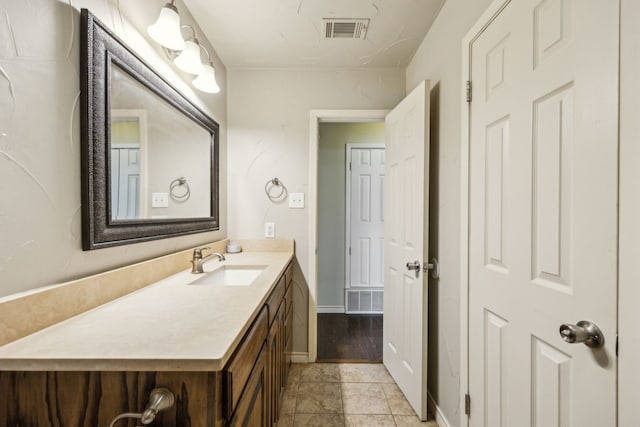 1003 N Washburn St, Decatur, TX 76234 - bathroom with vanity and baseboards