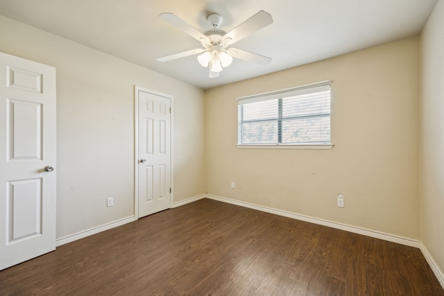 1003 N Washburn St, Decatur, TX 76234 - unfurnished bedroom with wood finished floors, baseboards, and ceiling fan