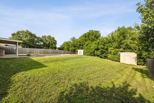 1003 N Washburn St, Decatur, TX 76234 - view of yard featuring a shed and an outbuilding