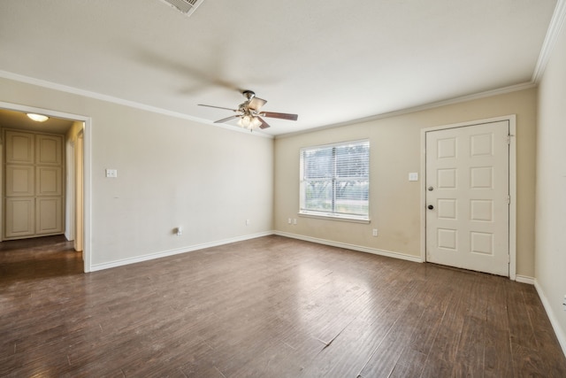 1003 N Washburn St, Decatur, TX 76234 - unfurnished living room with ceiling fan, crown molding, dark wood-style flooring, and baseboards