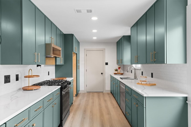 8338 Bocowood Dr, Dallas, TX 75228 - kitchen with gas range, a sink, exhaust hood, dishwasher, and light wood-type flooring