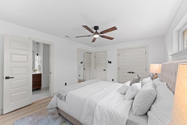8338 Bocowood Dr, Dallas, TX 75228 - bedroom with light wood-style floors and ceiling fan