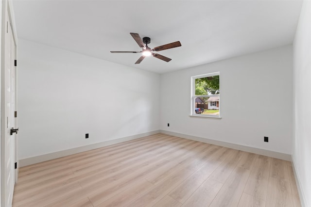 8338 Bocowood Dr, Dallas, TX 75228 - unfurnished room with a ceiling fan, light wood finished floors, and baseboards