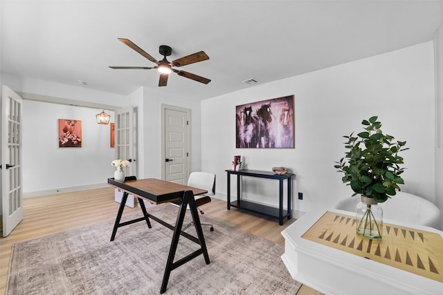 8338 Bocowood Dr, Dallas, TX 75228 - office space with wood finished floors, a ceiling fan, and baseboards