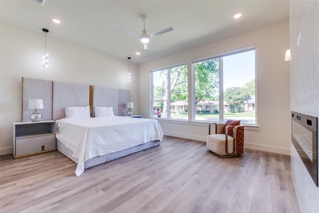 13554 Pyramid Dr, Farmers Branch, TX 75234 - bedroom featuring baseboards, light wood-type flooring, recessed lighting, and ceiling fan