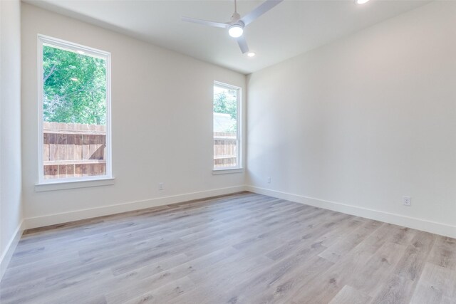 13554 Pyramid Dr, Farmers Branch, TX 75234 - empty room featuring plenty of natural light, light wood-style flooring, ceiling fan, and recessed lighting