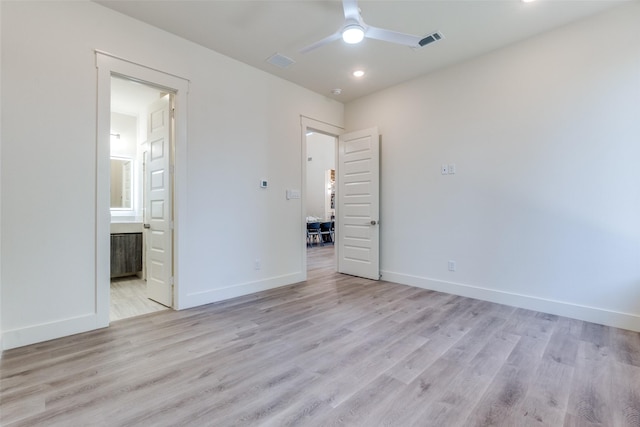 13554 Pyramid Dr, Farmers Branch, TX 75234 - unfurnished bedroom featuring light wood finished floors, baseboards, ensuite bath, recessed lighting, and a ceiling fan