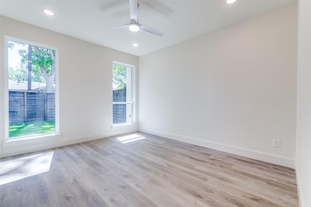13554 Pyramid Dr, Farmers Branch, TX 75234 - unfurnished room with healthy amount of natural light, light wood-type flooring, baseboards, and recessed lighting