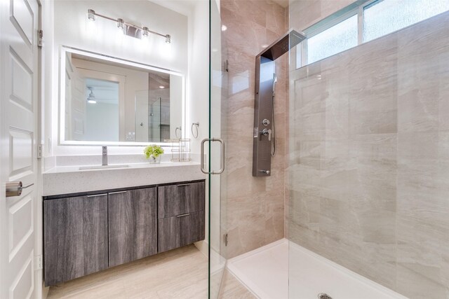 13554 Pyramid Dr, Farmers Branch, TX 75234 - bathroom with a shower stall and vanity