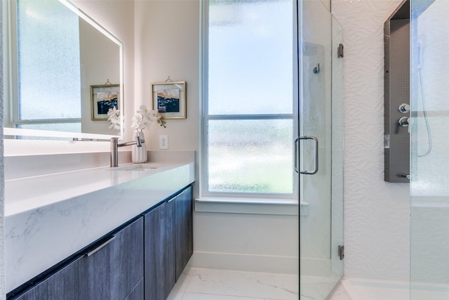 13554 Pyramid Dr, Farmers Branch, TX 75234 - full bathroom with a stall shower, baseboards, plenty of natural light, and vanity