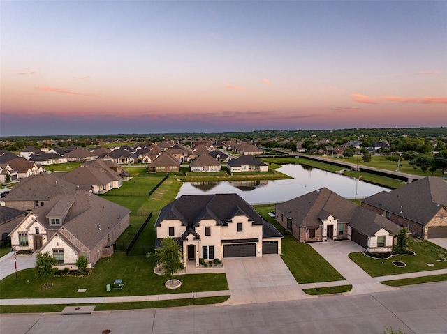 208 Johnson St, Granbury, TX 76048 - aerial view at dusk of a water view and a residential view