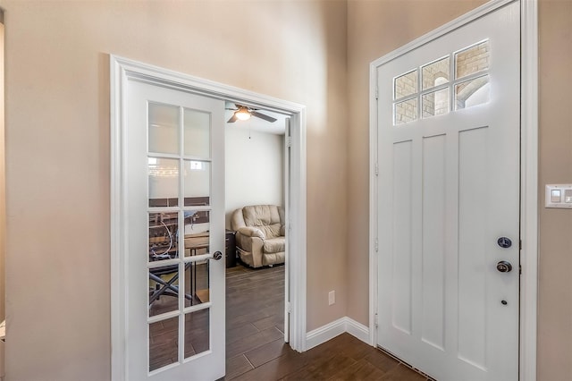 208 Johnson St, Granbury, TX 76048 - entryway featuring dark wood-style flooring, a ceiling fan, and baseboards