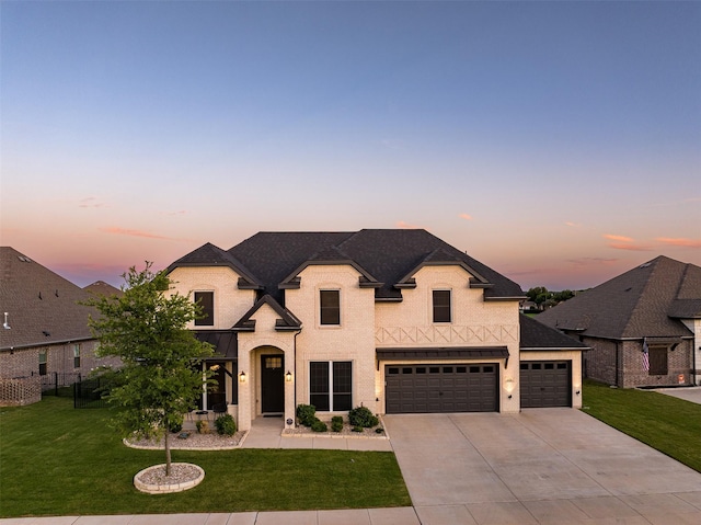 208 Johnson St, Granbury, TX 76048 - french country style house with driveway, a shingled roof, an attached garage, and a garage