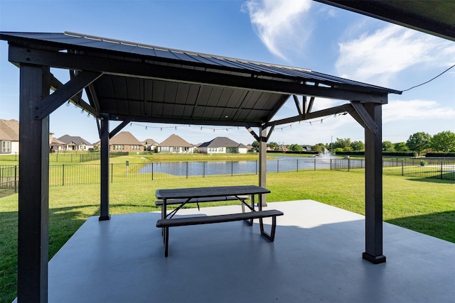 208 Johnson St, Granbury, TX 76048 - view of patio with a water view, a gazebo, and a residential view