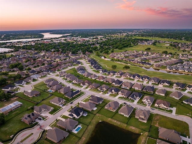208 Johnson St, Granbury, TX 76048 - aerial view at dusk of a water view, a residential view, and golf course view