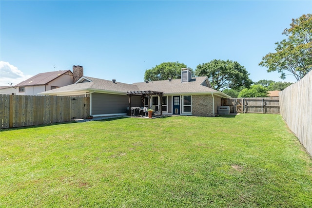 rear view of house with a pergola, a patio, and a chimney