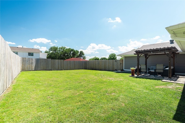 view of yard with a pergola and a patio