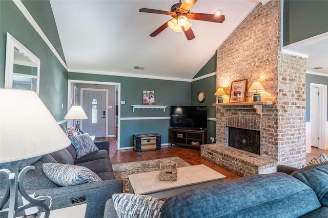 living room with lofted ceiling, crown molding, a ceiling fan, baseboards, and a fireplace