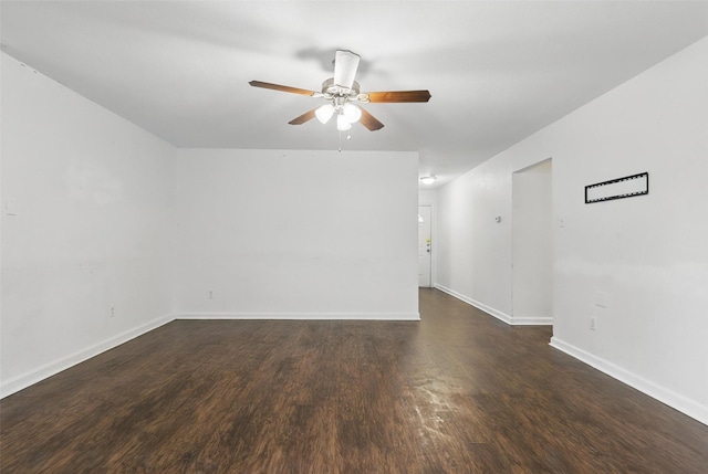 6716 Alma St, Forest Hill, TX 76140 - spare room with ceiling fan, dark wood-type flooring, and baseboards