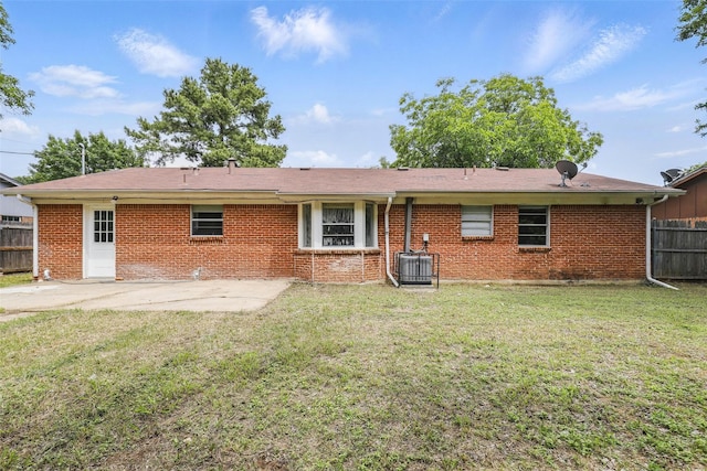 6716 Alma St, Forest Hill, TX 76140 - rear view of house featuring a patio area, brick siding, and central AC