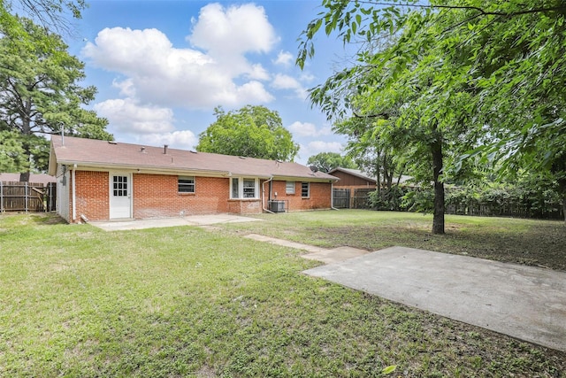 6716 Alma St, Forest Hill, TX 76140 - rear view of property with a patio area, brick siding, and central AC unit