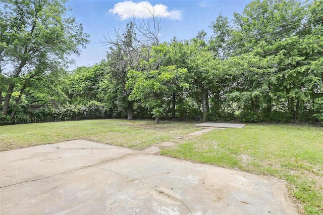 6716 Alma St, Forest Hill, TX 76140 - view of green lawn with a patio area