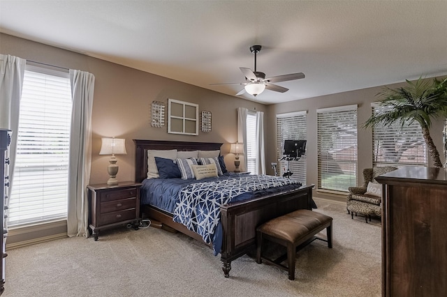 8306 Pecan Creek Dr, Arlington, TX 76001 - bedroom featuring light carpet and ceiling fan