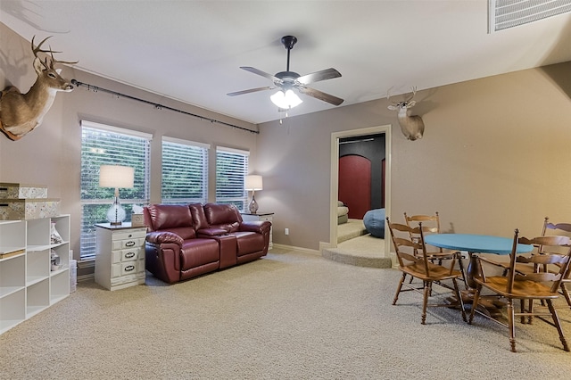 8306 Pecan Creek Dr, Arlington, TX 76001 - living room featuring carpet flooring, a ceiling fan, and baseboards