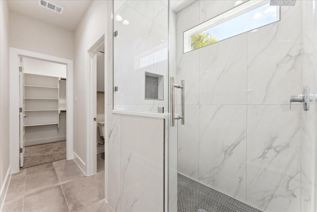 1903 Varsity Dr, Grand Prairie, TX 75051 - bathroom with a marble finish shower, toilet, and baseboards