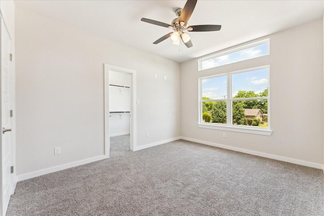 1903 Varsity Dr, Grand Prairie, TX 75051 - carpeted empty room featuring a ceiling fan and baseboards