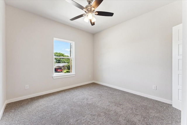 1903 Varsity Dr, Grand Prairie, TX 75051 - empty room featuring carpet flooring, baseboards, and a ceiling fan