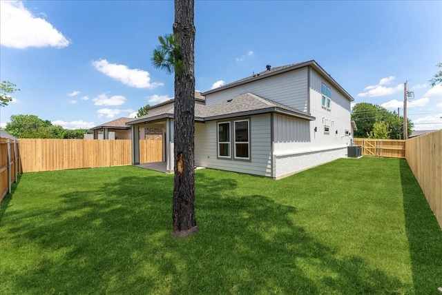 1903 Varsity Dr, Grand Prairie, TX 75051 - rear view of house with central AC unit