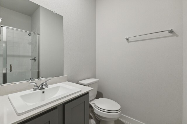 413 Marsh Dr, Lavon, TX 75166 - full bathroom featuring a stall shower, toilet, and vanity