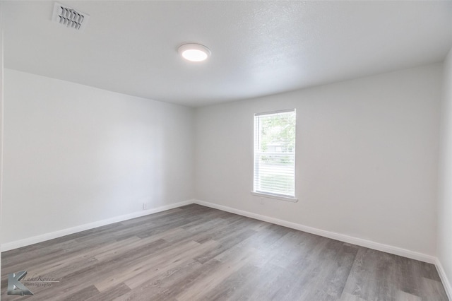 2942 Russell Ave, Abilene, TX 79605 - empty room featuring baseboards and wood finished floors