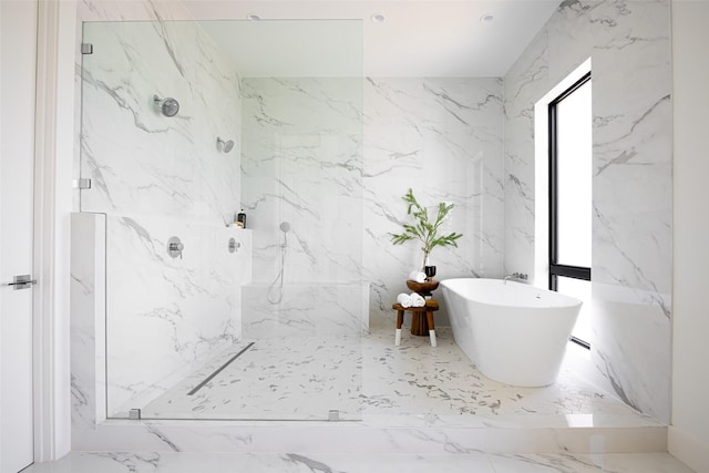 610 N Oak Cliff Blvd Unit 301, Dallas, TX 75208 - full bath featuring stone wall and a marble finish shower