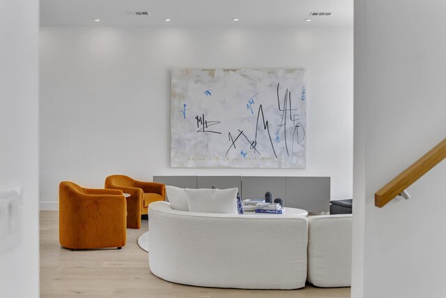 610 N Oak Cliff Blvd Unit 301, Dallas, TX 75208 - living room with wood finished floors and recessed lighting