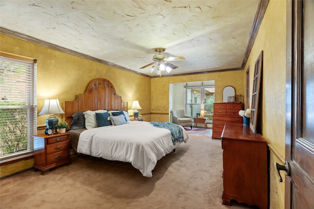 bedroom featuring multiple windows, crown molding, carpet floors, and a textured wall