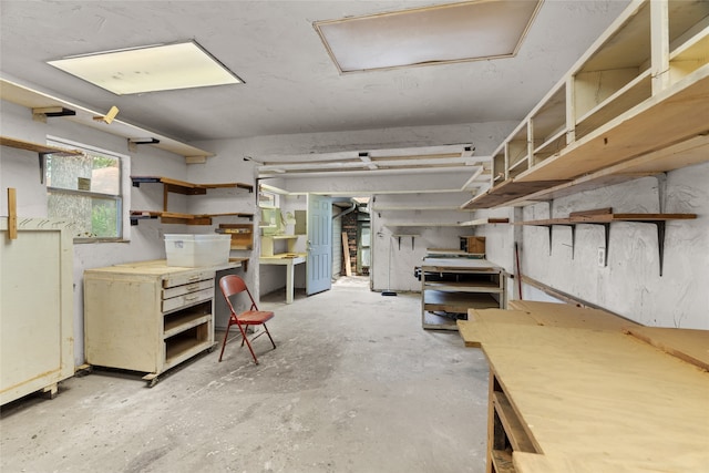 below grade area featuring a workshop area